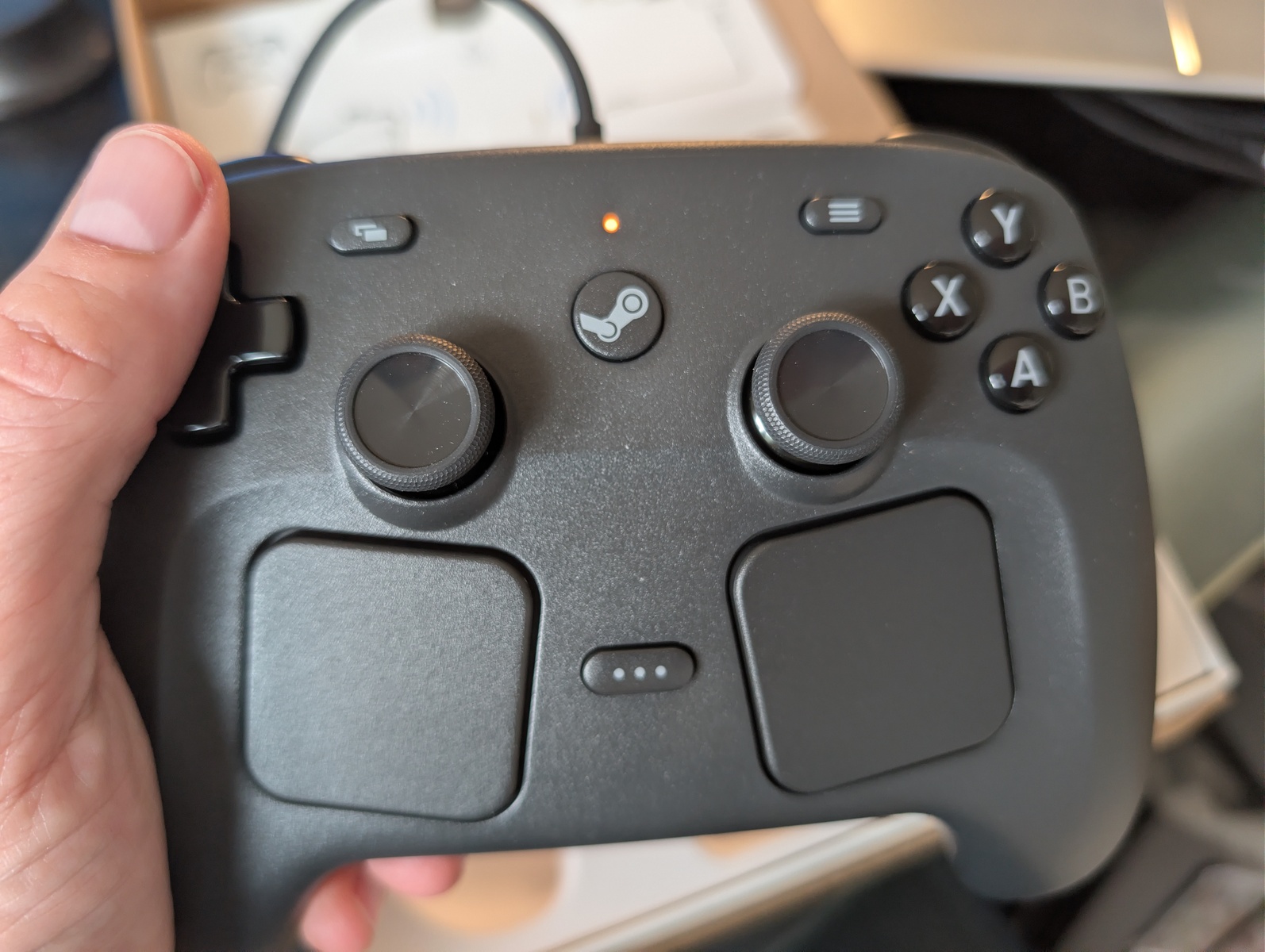 image of me holding the Steam Controller